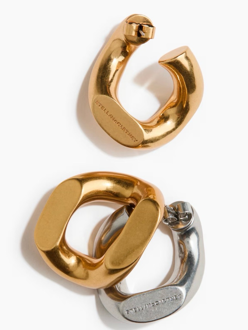 Stella McCartney Two-Tone Sculptural Hoop Earrings in Gold and Silver